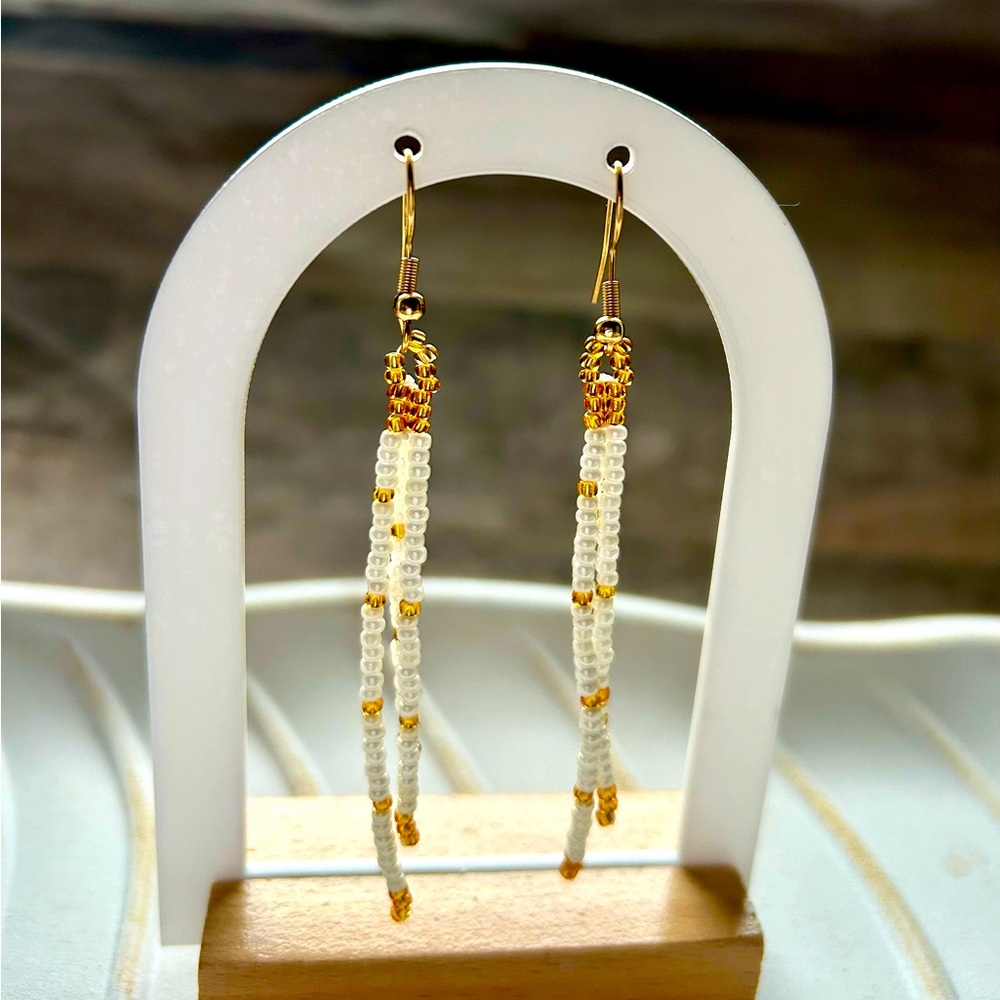 Elegant silver lined Gold and ivory Beaded Earrings